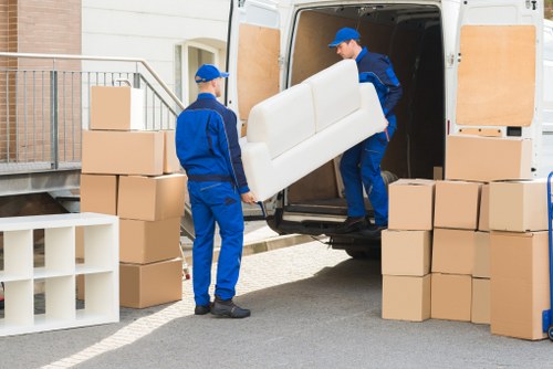 Packed boxes and furniture prepared for small removals service