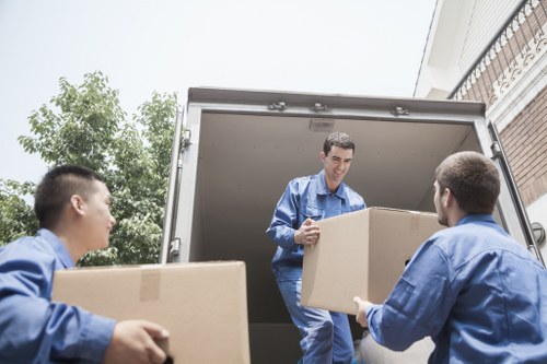 Flat removals in Earlscourt with moving boxes and van loading