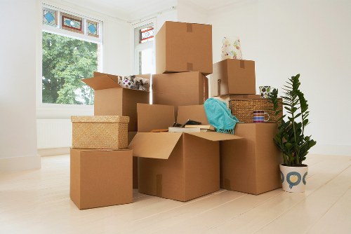 Carefully labeled moving boxes ready for transport in Earlscourt